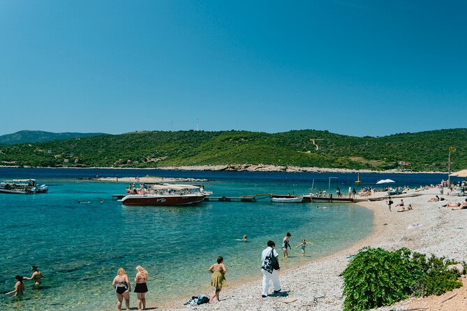 Blue Cave & 6 Islands Speedboat Tour From Split or Podstrana - Milna on Brač: a calmer harbor break with summer beach club access