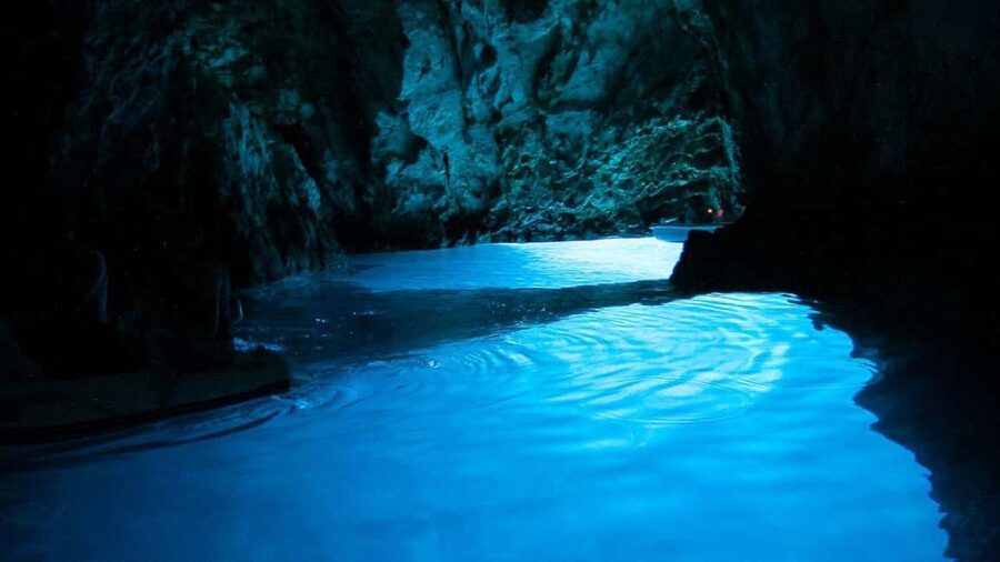 Blue Cave & Island-Hopping Tour with Snorkeling from Split - Komiža on Vis: fishermen-town walking time that feels real