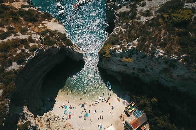 Blue Cave & Vis Island speedboat tour from Hvar - Stiniva Cove: the cliff-walled beach that feels otherworldly from the boat