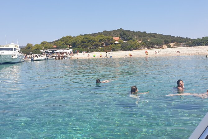 Blue & Green Cave Vis Island and Pakleni Islands Private Day Trip from Hvar - Stop 1: Budikovac Island swim time in open blue water