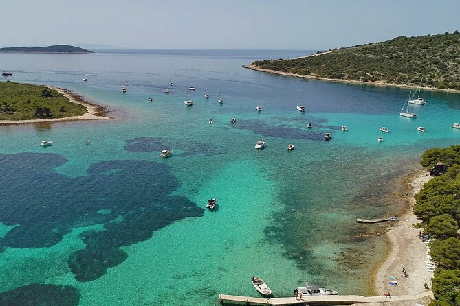 Blue Lagoon and 3 Islands Speedboat Tour from Trogir - Stop 1: Blue Lagoon and Krknjasi Bay for snorkeling and sun time