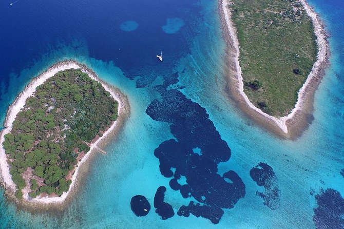 Blue Lagoon and Trogir Half-Day Speedboat Tour from Split - Blue Lagoon: swim, snorkel, and chase that turquoise glow