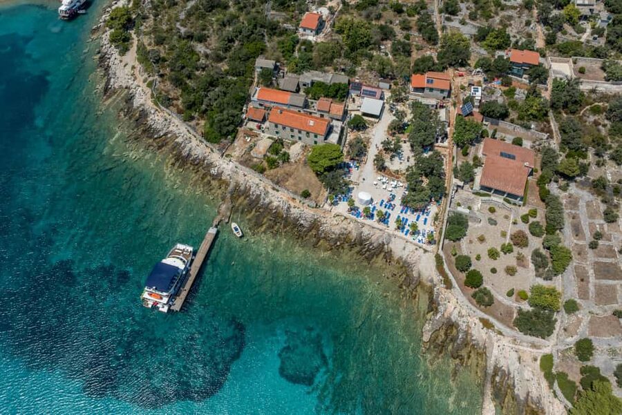 Blue Lagoon & Islands Day Cruise from Split with Lunch - Drvenik and the Blue Lagoon area: sea calm, dolphin hopes, and beach time