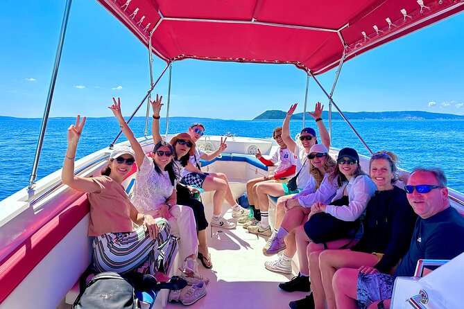 Blue Lagoon Tour from Split with Bottled Water and Wine Included - Krknjasi Bay Blue Lagoon Hour: Snorkel Gear, Clear Water, and Beach-Bar Relaxing