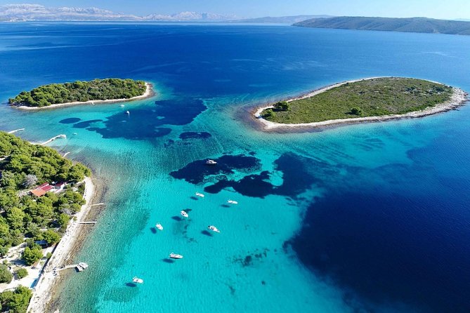 Blue Lagoon, Trogir & Čiovo catamaran tour with Food and Drinks - Blue Lagoon and Krknjasi Bay: Your First Swim Stop