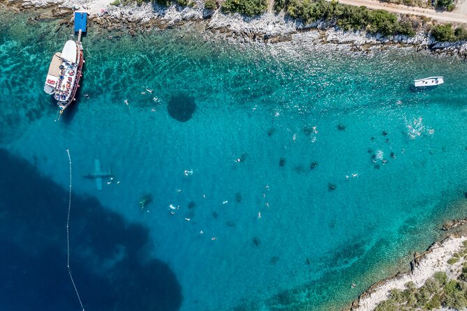 Blue Lagoon & Underwater Museum from Split with Lunch & Drinks - The final beach stop: loungers, water fun, and the small aqua park