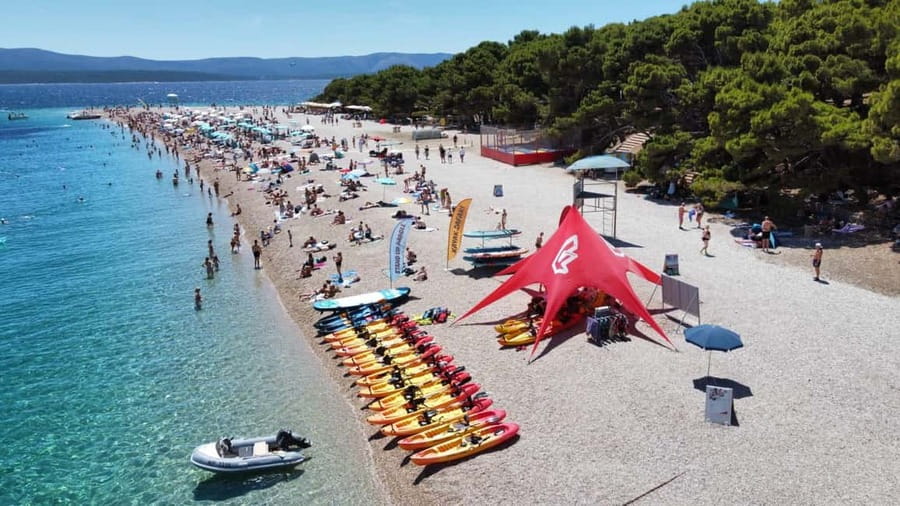 Bol: Zlatni Rat Beach Kayak Tour with Snorkeling - Meeting at the KAYAK SAFARI flags in Bol