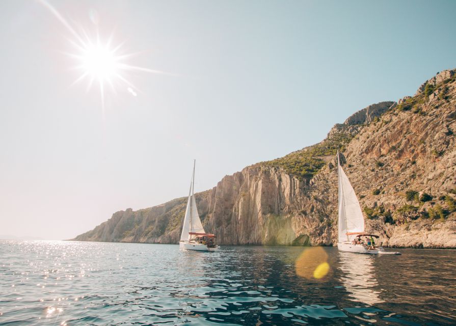 From Hvar: Boat Tour to Pakleni Islands on a Comfort Yacht - First Pakleni stop: sheltered swimming, snorkeling gear, and easy activity options