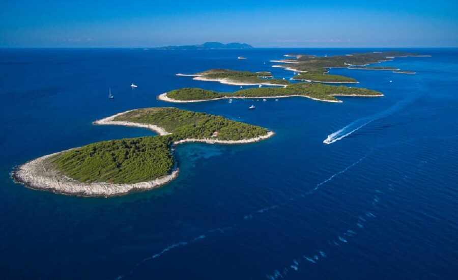 From Split: Blue Cave & 5 Islands Amazing Speedboat Tour - The Blue Cave stop: tickets, glow, and why timing matters