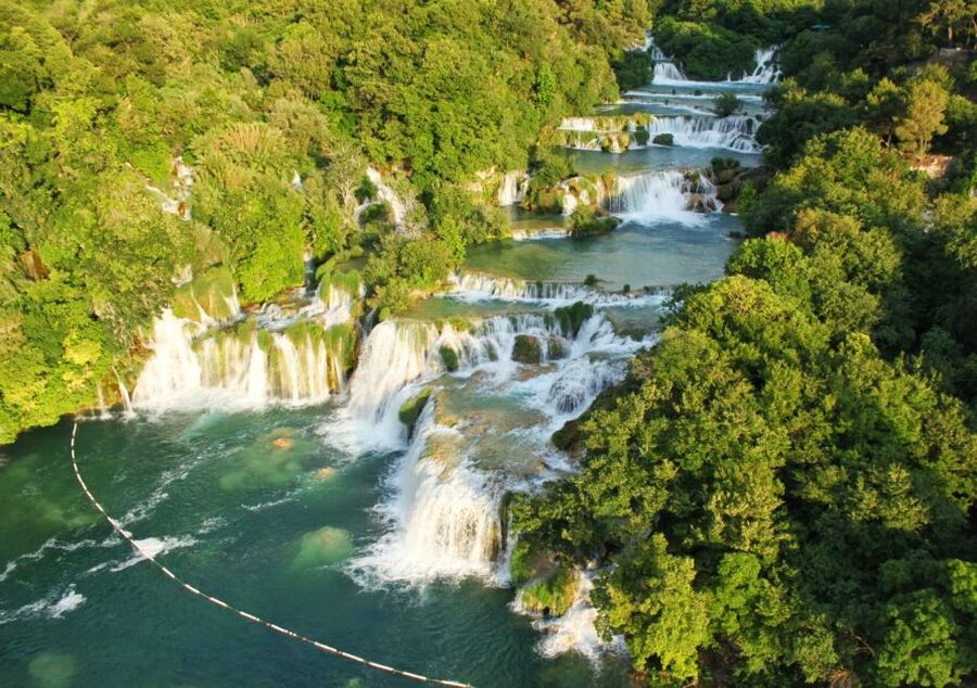 From Split: Krka Waterfalls Cruise & Trogir Walking Tour - The panoramic river boat to Skradin: views plus a swim break