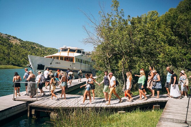 From Split: Krka Waterfalls, Food & Wine Tasting Tour - Krka National Park boardwalks, travertine falls, and the Nikola Tesla stop