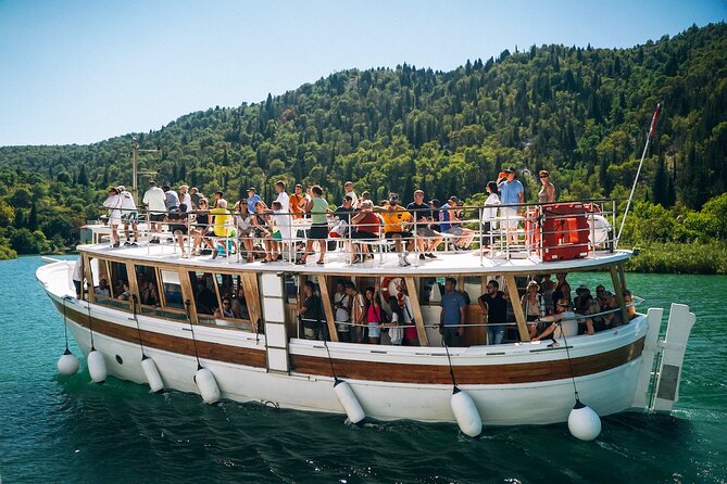 From Split: Krka Waterfalls Tour, Boat Cruise & Swimming - Krka National Park: waterfalls, travertine formations, and a park you can actually enjoy