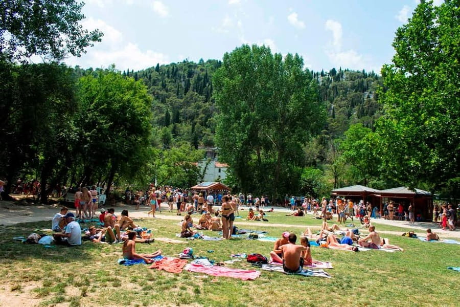 From Split: Krka Waterfalls Tour with Boat Ride & Swimming - Skradin town time and the beach swim window