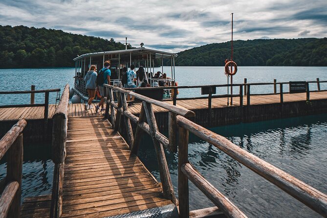 From Split: Self-Guided Plitvice Lakes Day Tour with Boat Ride - Boat ride vs electric train views: comfort wins