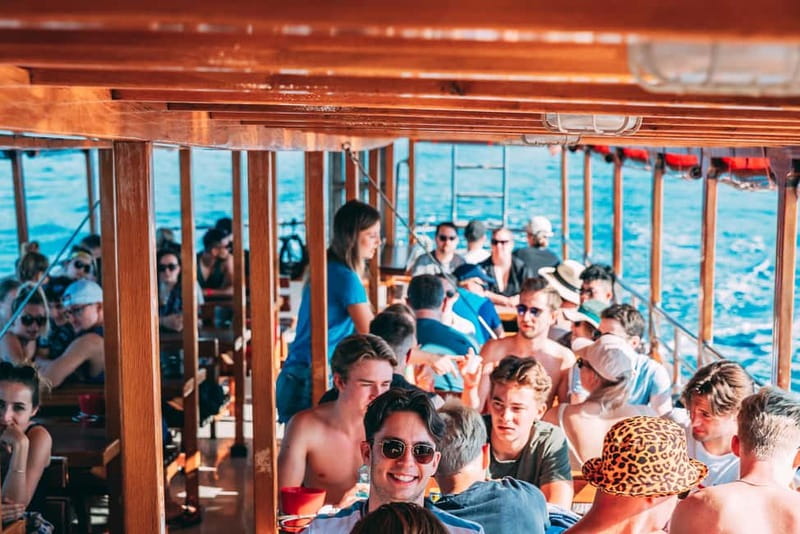 From Trogir: Blue Lagoon & Šolta Cruise with Lunch & Drinks - Lunch under 100-year-old pine trees with unlimited local drinks