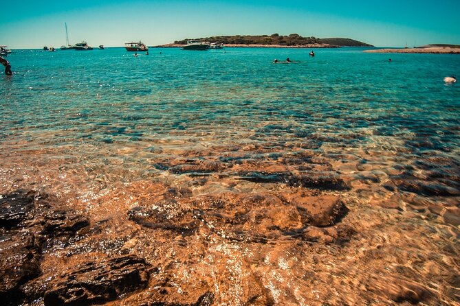 Fully customized private boat trip from Trogir and Split - Blue Lagoon and Krknjasi Bay: swim, snorkel, and a floating-bar moment