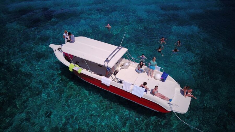 Hvar: Private Blue Cave and Vis Speedboat Tour - The boat setup: 11 meters, a sundeck, and a bathing platform you’ll use