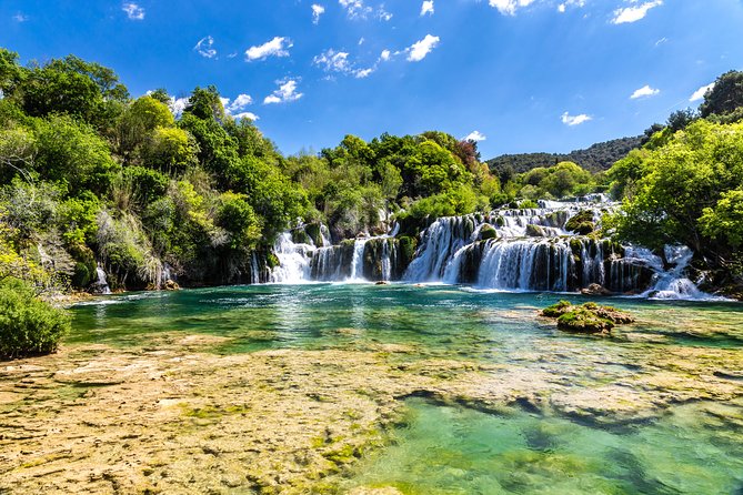 Krka Waterfalls & historic Šibenik - driver&guide, boat cruise, lunch break - Old mills turned ethnographic stops: how to read the park