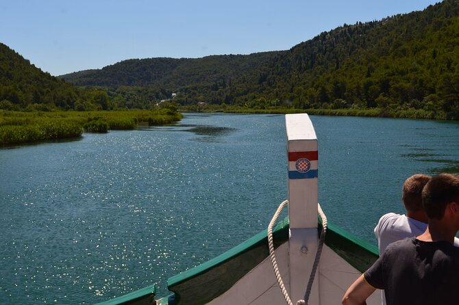 Krka Waterfalls National Park Boat Tour from Vodice - Meeting in Vodice and settling into the boat day