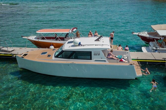 Luxury Boat - Blue Cave From Split Island-Hopping Full-Day Cruise, Hvar, Vis - Stiniva Cove and Krknjasi Bay: the short swim stops that set the tone
