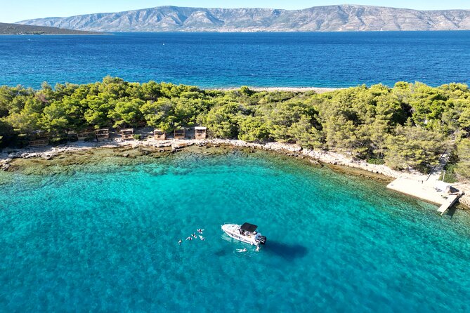 Makarska: 3-Island Speedboat Tour with Cave and Blue Lagoon - Boat, safety gear, and the ladder reality check