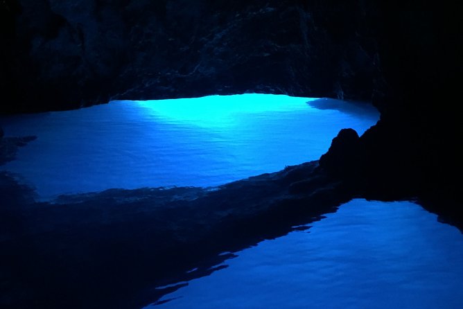 Private Blue and Green Cave Tour from Hvar Town - Stop 1, Green Cave on Ravnik Island: Emerald Water and a Short Swim Window