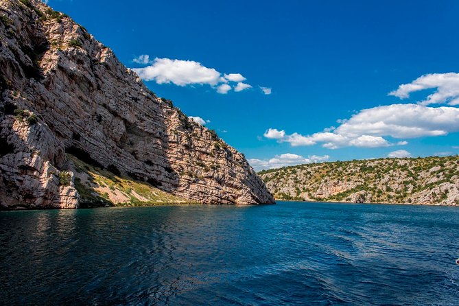 Private Krka Waterfalls Tour With Boat Ride & Swimming - Skradinski Buk: waterfall views, mills, and an ethno village