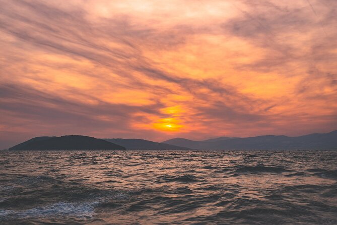 Private Sunset Tour from Split + Bottle of Wine Included - The Main Event: Boat Ride, Music, Sunset Watching, and a Swim