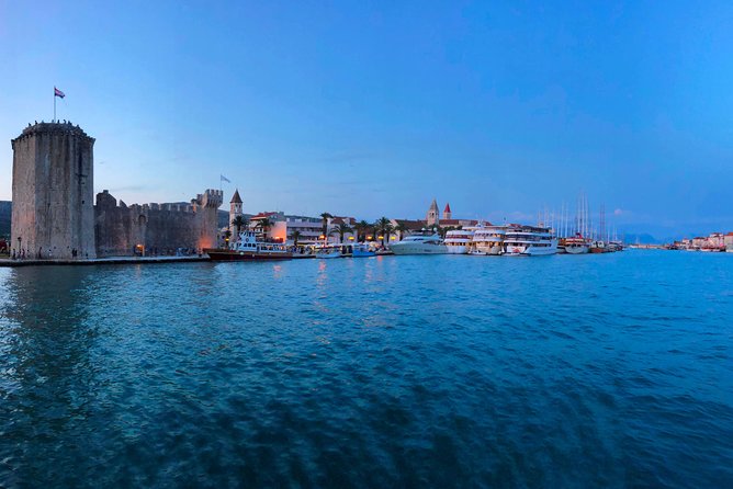 Private Sunset Tour from Trogir by Speedboat - Stop 1: Blue Lagoon and Krknjasi Bay swim time with provided snorkeling gear