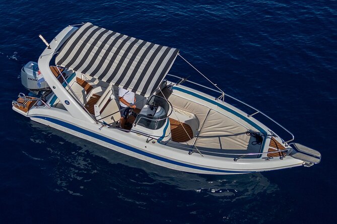 Red Rocks, Hvar Bays & Pakleni – Private Boat Tour from Hvar - Stop 1: Hvar Red Rocks, crimson cliffs and a first swim