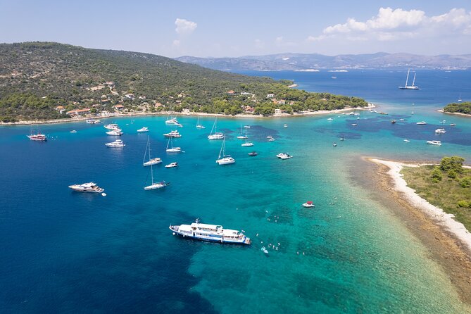 Slatine - Island Hopping Excursion (Trogir/Blue Lagoon/Shipwreck) - Blue Lagoon and Krknjasi Bay: swimming time, snorkel gear, and the aquaslide