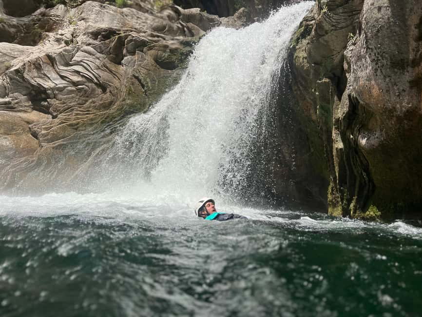 Small Group Canyoning with proffesional guide - The canyon action: 200 meters down, with optional jumps and rapids