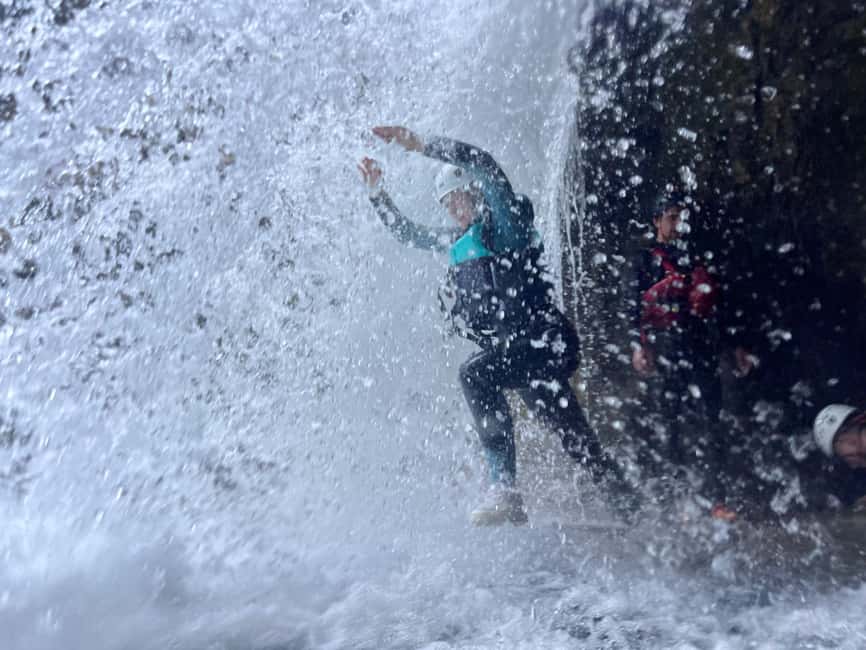 Small Group Canyoning with proffesional guide - The signature vertical moment: the 55-meter abseil