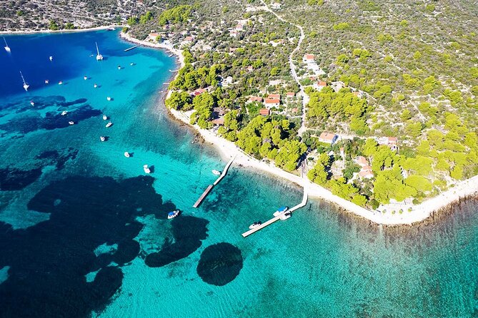 Speedboat Blue Lagoon & 3 Islands tour from Trogir - Stop One: Drvenik Mali and the White Lagoon Swimming Hour