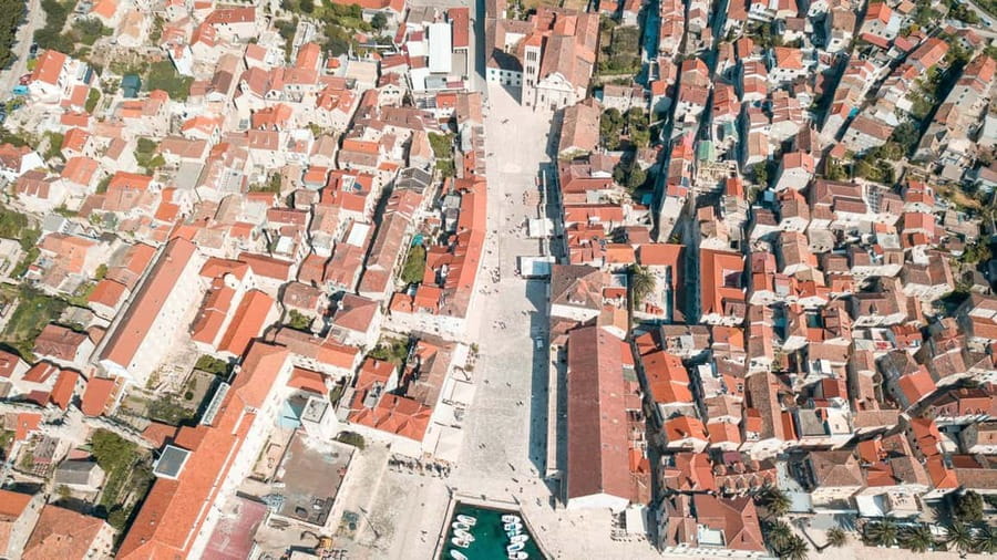 Split: 5 Islands Full-Day Tour to Blue Cave, Vis & Hvar - Stiniva Cove Stop: Photo Time and the Walkable Cliff Drama