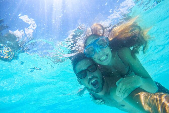 Split: Blue Lagoon, Hvar, Brač, 6 Islands Boat Tour - Small Group - Labadusa beach on Čiovo: the final swim, with a beach bar
