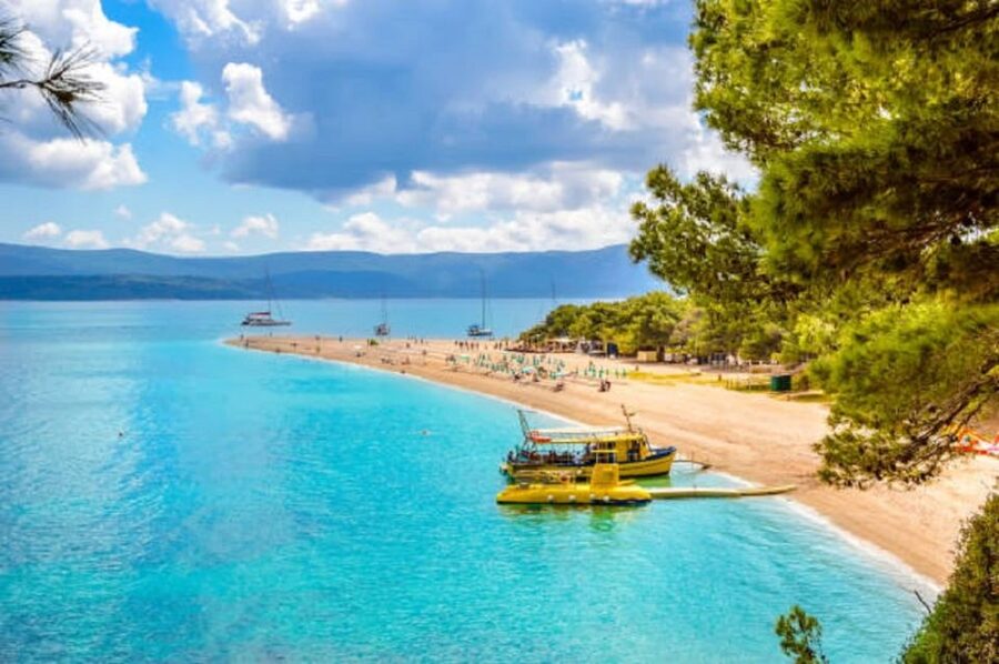 Split: Bol, Hvar, Pakleni Island, and Solta Full-Day Tour - Bol on Brač: Zlatni Rat, swimming time, and using two hours well