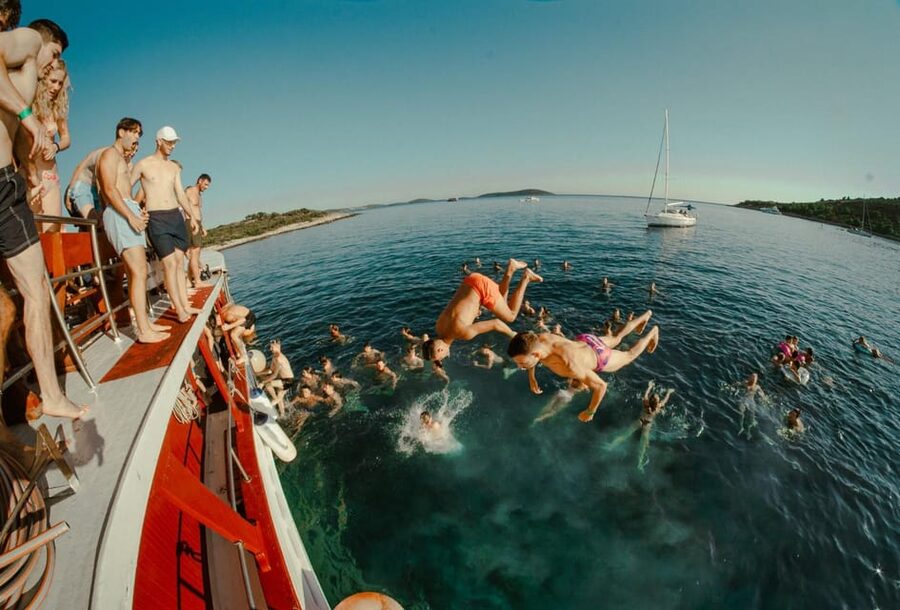 Split: Floating Festival Boat Party with Electronic Music - Cruising toward Split, then turning it up as sunset hits