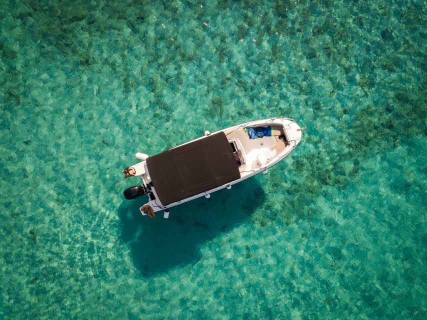 Split: Private Full Day Boat Trip to Blue Lagoon and Trogir - Blue Lagoon morning: snorkeling, swimming, and that clear-water feeling