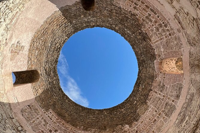 Split Private Walking Tour for Families with kids from 5-17 years - Tiny streets, a 24-digit clock, and symbols you can spot