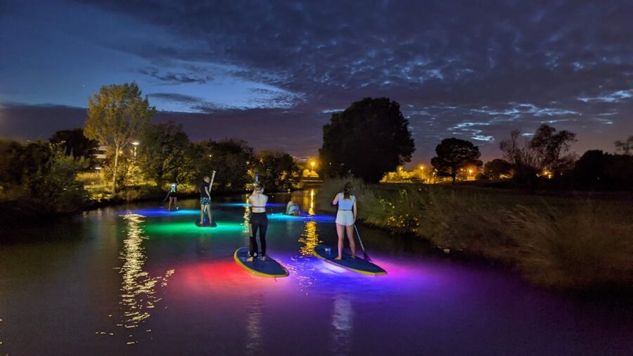 Split: Stand Up Paddleboard Night Glow Tour - Price and value: $51 for LED boards, instruction, insurance, and transfers