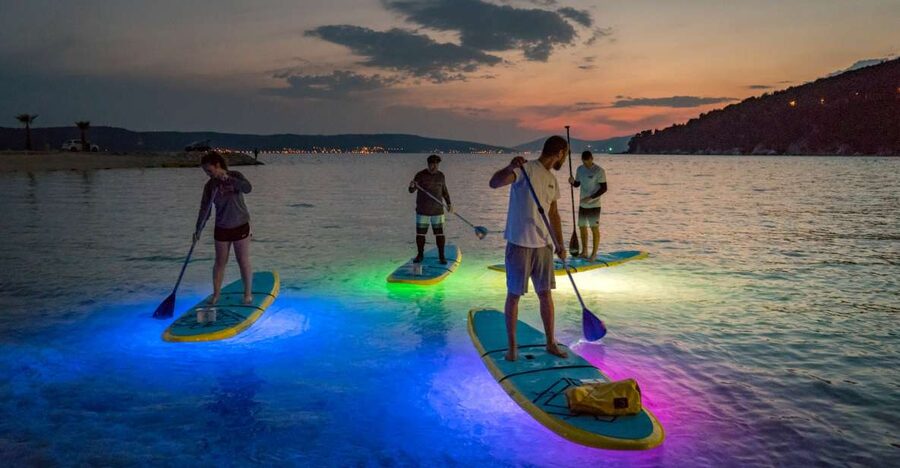 Split: Stand Up Paddleboard Night Glow Tour - Beginner coaching that gets you standing at a calm pace