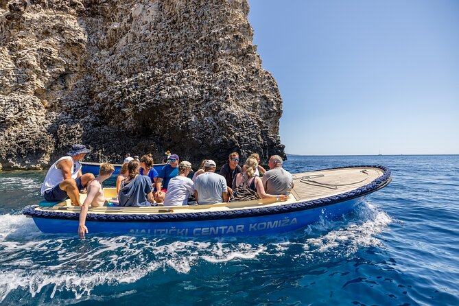 Split/Trogir: Blue Cave, Vis, and Hvar Speedboat Day Tour - Blue Cave (Biševo): the €24 cash ticket and the small-boat transfer
