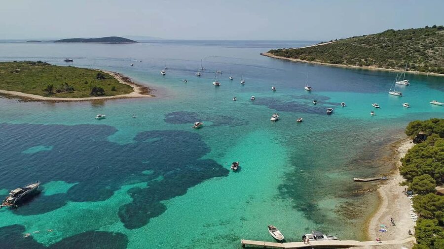 Trogir: Blue Lagoon and 3 Islands Speedboat Tour - Blue Lagoon swim stop near Split: snorkeling, photos, and beach time