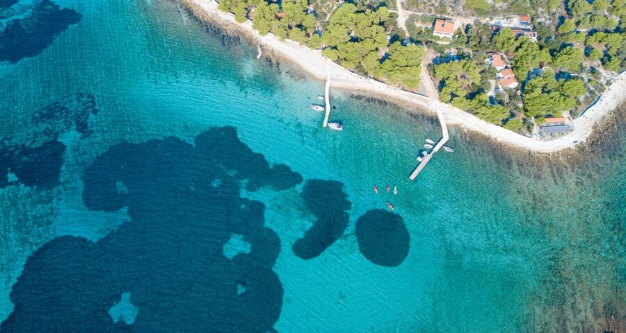 Trogir: Blue Lagoon, Maslinica, and Solinska Bay Boat Tour - Krknjaši Blue Lagoon near Drvenik Veli: where the water earns its name